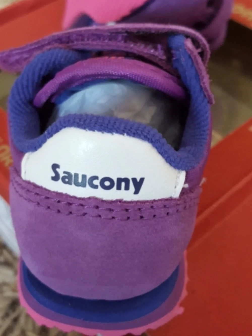 Saucony baby jazz crib shoes in purple and pink